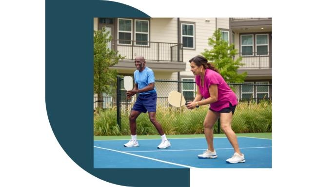 couple playing pickle ball