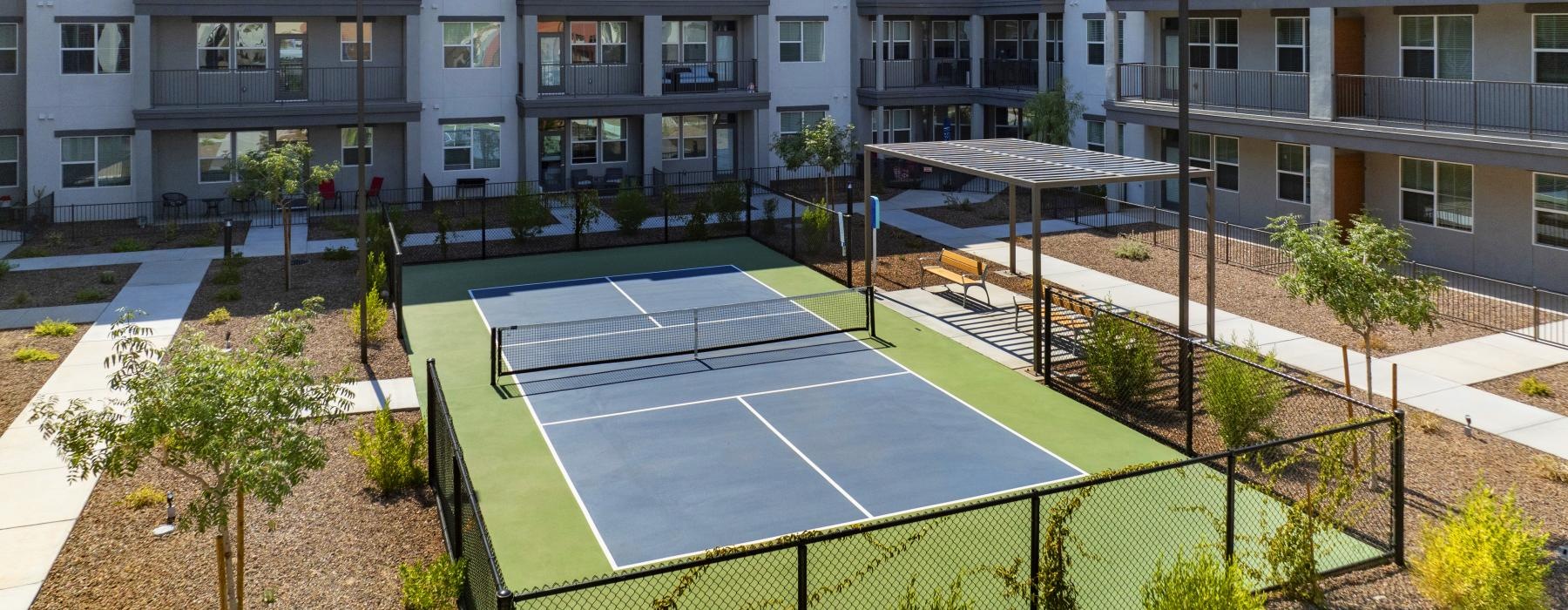 fenced in pickle ball court outdoors